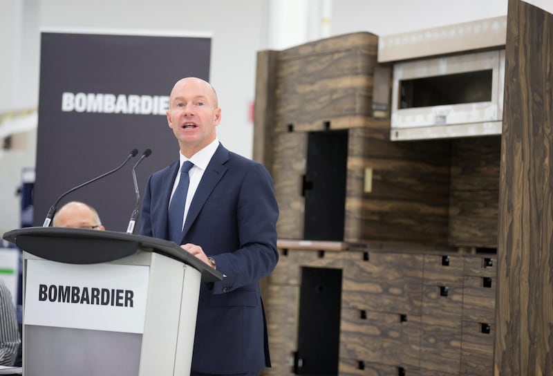 FILE PHOTO: Alain Bellemare, President and CEO of Bombardier Inc., speaks during a news conference on the acceleration of Global 7000 business jet aircraft interior completion operations and the inauguration of the new Bombardier Centre of Excellence in Pointe-Claire, Quebec, Canada, November 17, 2017.  REUTERS/Christinne Muschi/File Photo