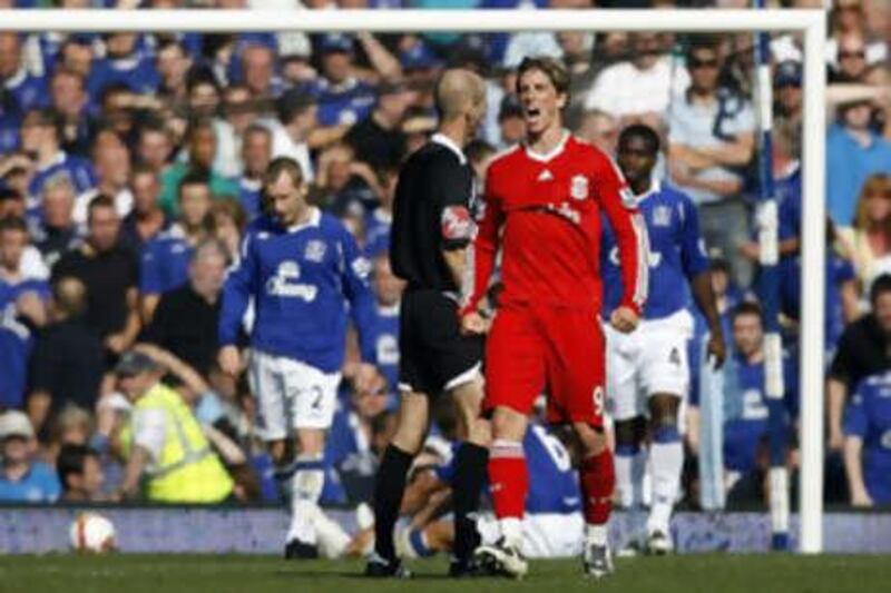 Fernando Torres celebrates after scoring Liverpool's first goal.
