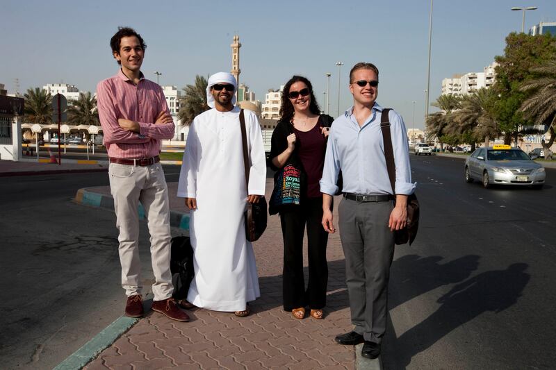 Abu Dhabi, United Arab Emirates - August 01 2013 - (L-R) National reporters Hareth Al Bustani, Thamer Al Subaihi, Emily Cleland and Kyle Sinclair prior to the race to Dubai.  Four National reporters raced from Abu Dhabi to Dubai using various modes of transport to see which vehicle took the least time between two cities.  (Razan Alzayani / The National) 