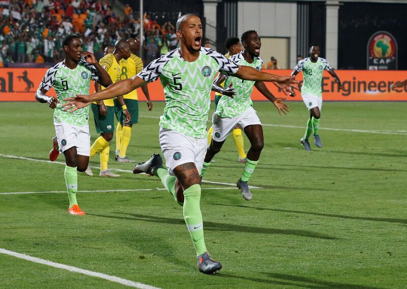 Soccer Football - Africa Cup of Nations 2019 - Quarter Final - Nigeria v South Africa - Cairo International Stadium, Cairo, Egypt - July 10, 2019  Nigeria's William Troost-Ekong celebrates scoring their second goal    REUTERS/Amr Abdallah Dalsh