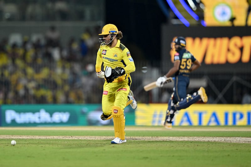 Chennai Super Kings' wicketkeeper MS Dhoni fields the ball. AFP