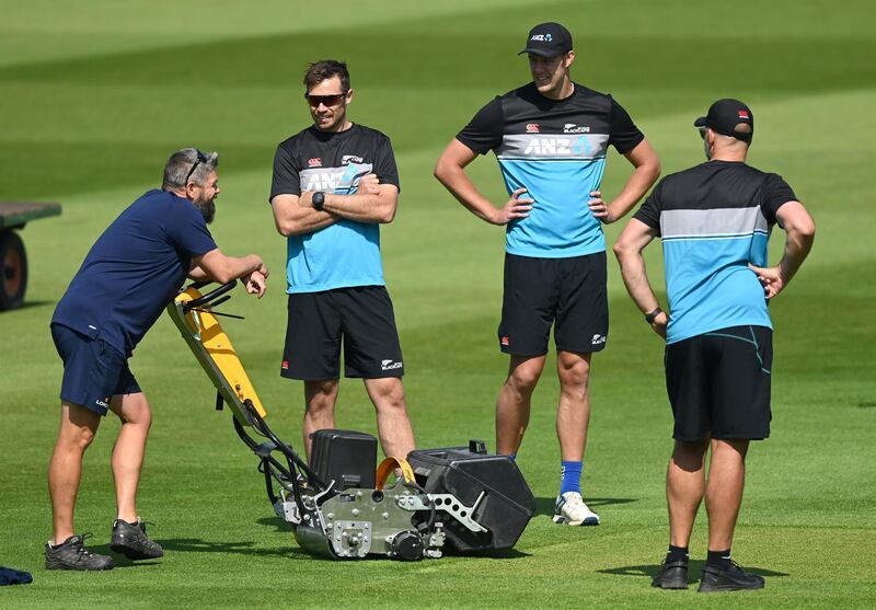Fast bowlers Tim Southee and Kyle Jamieson speak to Lords groundsman Karl McDermott during a nets session at Lord's. Getty