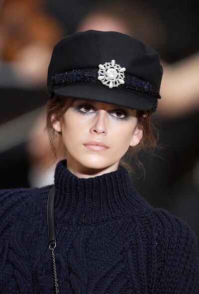 Model of the moment Kaia Gerber in one of the naval-inspired hats from Chanel latest Métiers d’Art collection