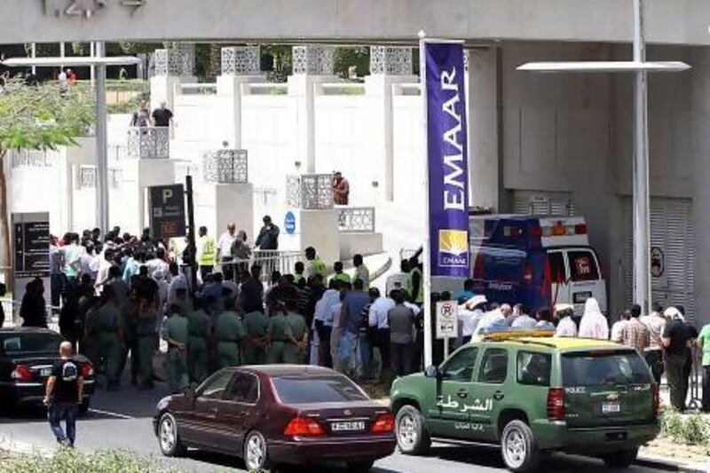 Demand for Dubai properties are rising again. Seen here are people who queued up for hours outside Emaar's Sales Office in April 2013, in hopes of buying property from the developer. Satish Kumar / The National