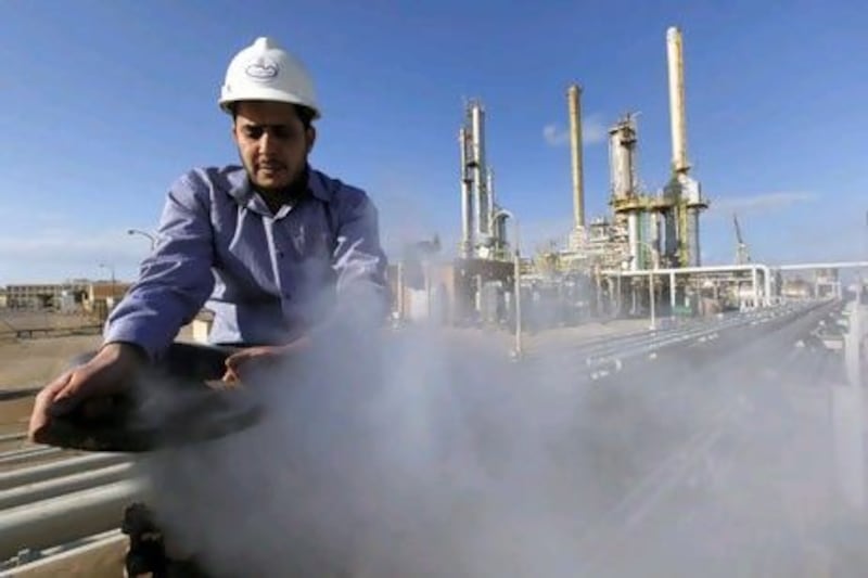 A Libyan oil worker at a refinery inside the Brega oil complex in Libya.