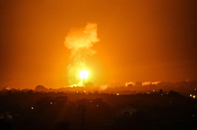 Smoke and flames rise after Israeli army war planes carried out airstrikes over Khan Yunis, Gaza Strip.  AFP