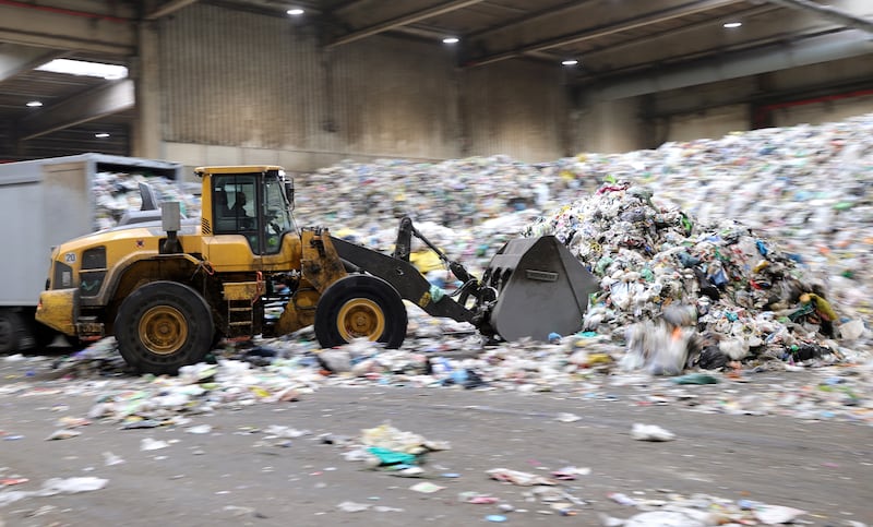 A worker carries plastic waste with a wheel loader at the Interzero recycling plant in Marl, Germany. According to the Federal Environment Agency, 99.4 per cent of all collected plastic waste was recycled in Germany in 2019. EPA 