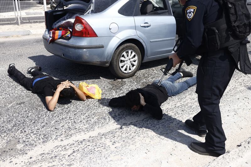 Israeli police check the occupants of a vehicle near Ashkelon, Israel. Bloomberg