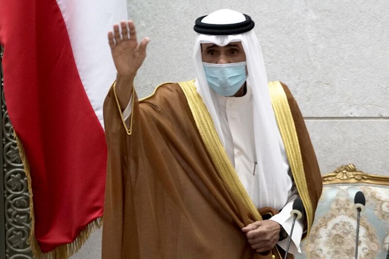 FILE PHOTO: FILE PHOTO: Kuwait's new Emir Nawaf al-Ahmad al-Sabah gestures as he takes the oath of office at the parliament, in Kuwait City, Kuwait September 30, 2020. REUTERS/Stephanie McGehee/File Photo