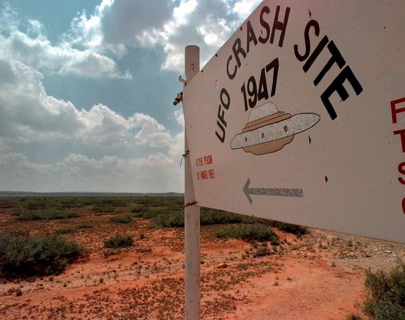 A sign in 1997 near Roswell, New Mexico, where in 1947, debris was recovered from what many claimed was a flying saucer. AP