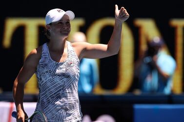 Australia's Ashleigh Barty celebrates after winning the match against Italy's Lucia Bronzetti during their women's singles match on day three of the Australian Open tennis tournament in Melbourne on January 19, 2022.  (Photo by Martin KEEP  /  AFP)  /  -- IMAGE RESTRICTED TO EDITORIAL USE - STRICTLY NO COMMERCIAL USE --