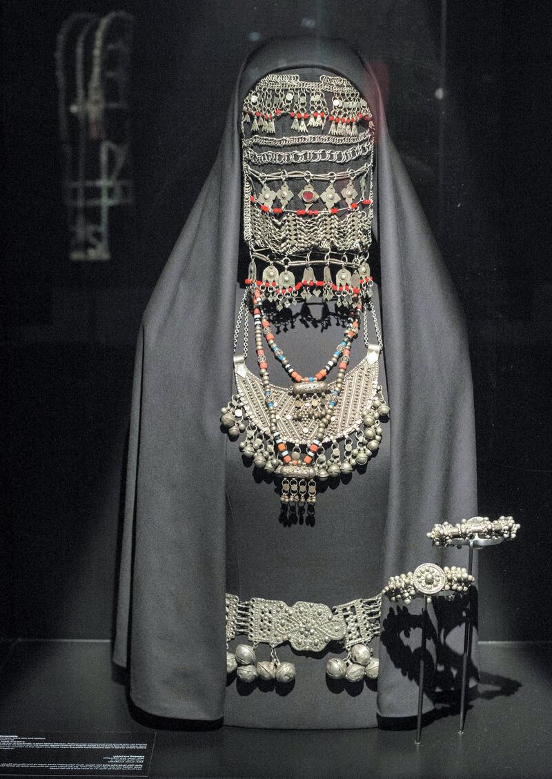 DUBAI, UNITED ARAB EMIRATES -A jewelry ensemble, headpiece, necklace, bangles and waist belt on display at the Hidden Treasures, a look at early 20th century Saudi Arabia jewelry,  show how diverse the different regions fashion was. Leslie Pableo for The National