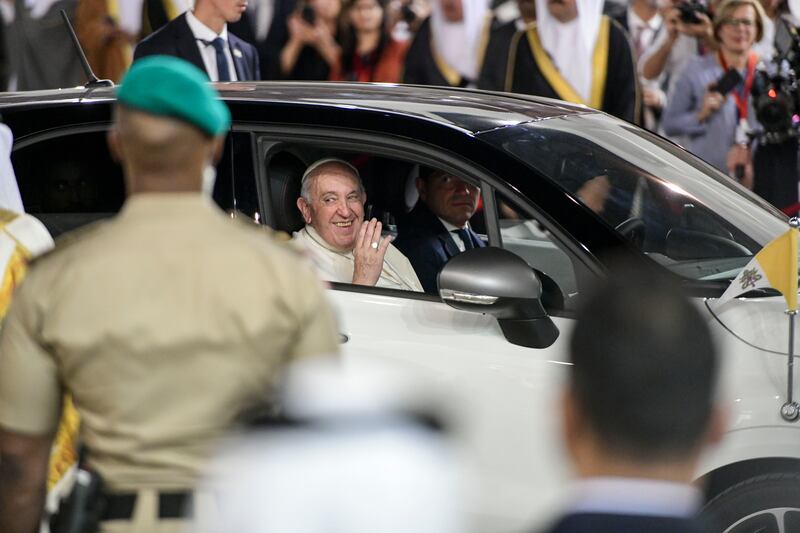 The Pope waves to the audience at Sakhir Palace. Khushnum Bhandari / The National