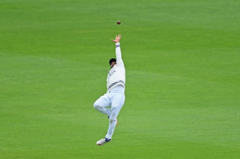 India fielder Ajinkya Rahane cannot reach a shot from New Zealand's Tom Latham. AFP