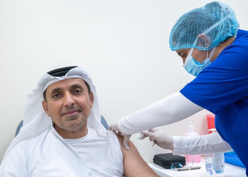 Maj Gen Talal Al Falasi, director general of Dubai's State Security Department, receives his first dose of the Pfizer-BioNTech vaccine. Courtesy: Dubai Media Office