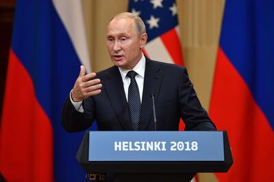 Russia's President Vladimir Putin speaks during a joint press conference with US President after a meeting at the Presidential Palace in Helsinki, on July 16, 2018. The US and Russian leaders opened an historic summit in Helsinki, with Donald Trump promising an "extraordinary relationship" and Vladimir Putin saying it was high time to thrash out disputes around the world.
 / AFP / Yuri KADOBNOV
