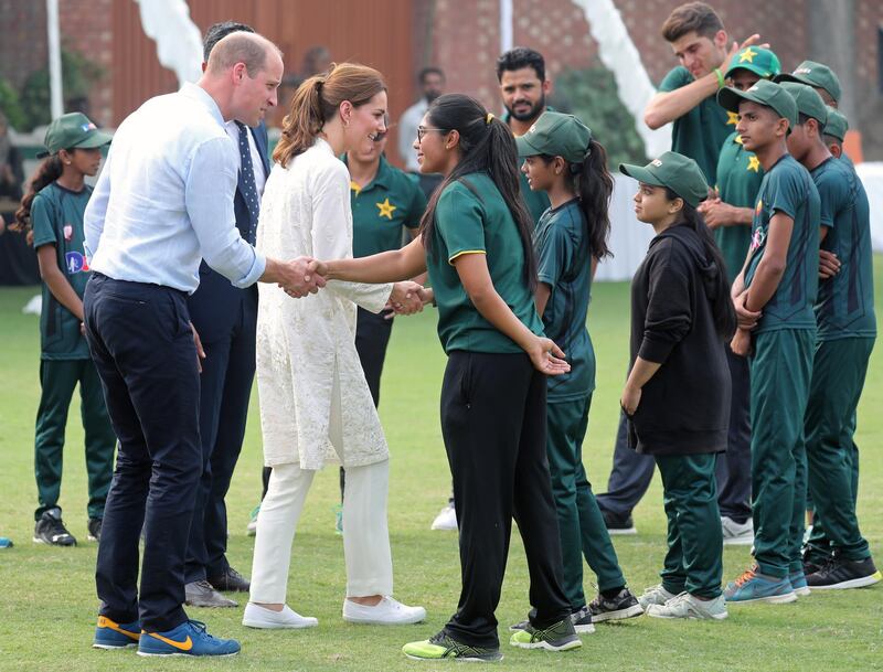 Prince William, Duke of Cambridge and Catherine, Duchess of Cambridge greet players during their visit at the National Cricket Academy during day four of their royal tour of Pakistan on Thursday, October 17, 2019 in Lahore, Pakistan. Getty Images