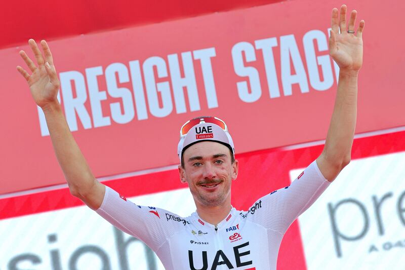 UAE Team Emirates' US cyclist Brandon Mcnulty waves from the podium after he won the second stage of the 6th UAE Cycling Tour from al-Hudayriyat Island to al-Hudayriyat Island on February 20, 2024.  (Photo by Giuseppe CACACE  /  AFP)