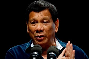 Philippine President Rodrigo Duterte said Sunday that a ban on Filipino workers from heading to Kuwait that's been in effect since February would now be permanent, inflaming a diplomatic dispute.  Yong Teck Lim / AP  