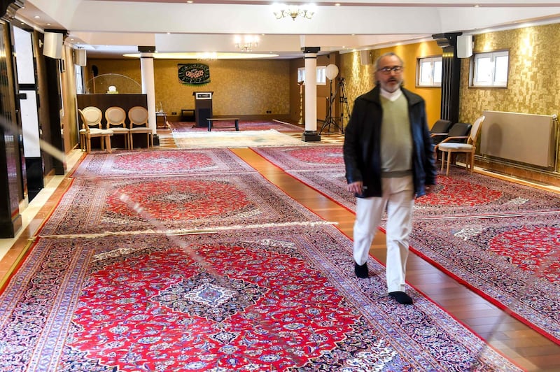 This picture taken on October 2, 2018 shows the prayer room of the Zahra Centre, the headquarters of a a Shiite Islamic association in Grande Synthe, northern France, after it was raided by 200 police men as well as the homes of its leaders who are suspected of supporting "terrorist organisations." Eleven people had been arrested while French authorities also froze the financial assets of the centre which is headed by Yahia Gouasmi, who is known for his anti-Zionist views and links to Iran. Police have been closely following the activities of the Zahra Centre "because of the strong support by its leaders for several terrorist organisations and in favour of movements backing ideas that are contrary to the values" of France. On its website, the association says its purpose since its foundation in 2009 has been "to make known the message of Islam through the eyes of the Prophet and his family." It was unclear whether the arrests were linked to a suspected plot in France to bomb a gathering of Iranian opposition group the National Council of Resistance of Iran (NCRI) in June. / AFP / Philippe HUGUEN
