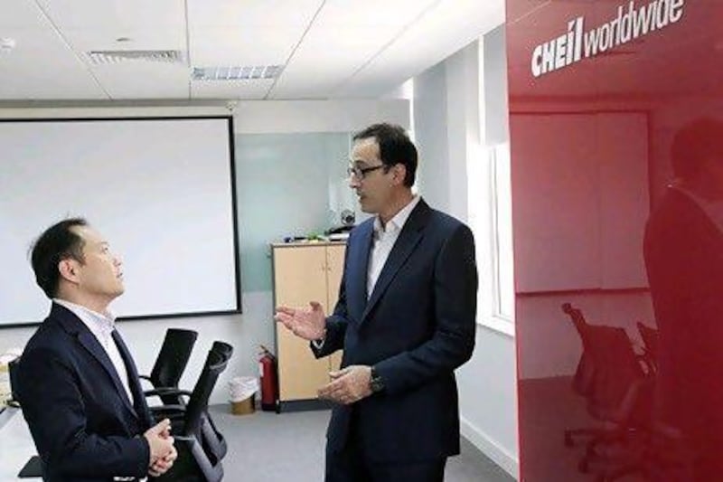 Azmi Yafi, left, chief operating officer, and Keesoo Kim, the regional chief executive, of Cheil want to take advantage of the growing relationship between South Korea and the UAE. Satish Kumar / The National