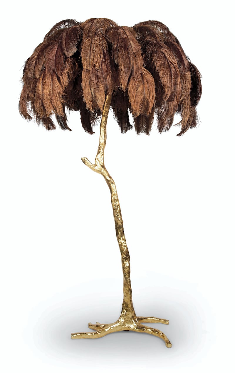 Lot 64: chocolate resin and ostrich feather floor lamp. Photo: Dreweatts