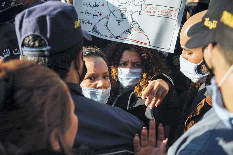 Protesters and police square off on Avenue Habib Bourguiba on Tuesday. Erin Clare Brown / The National