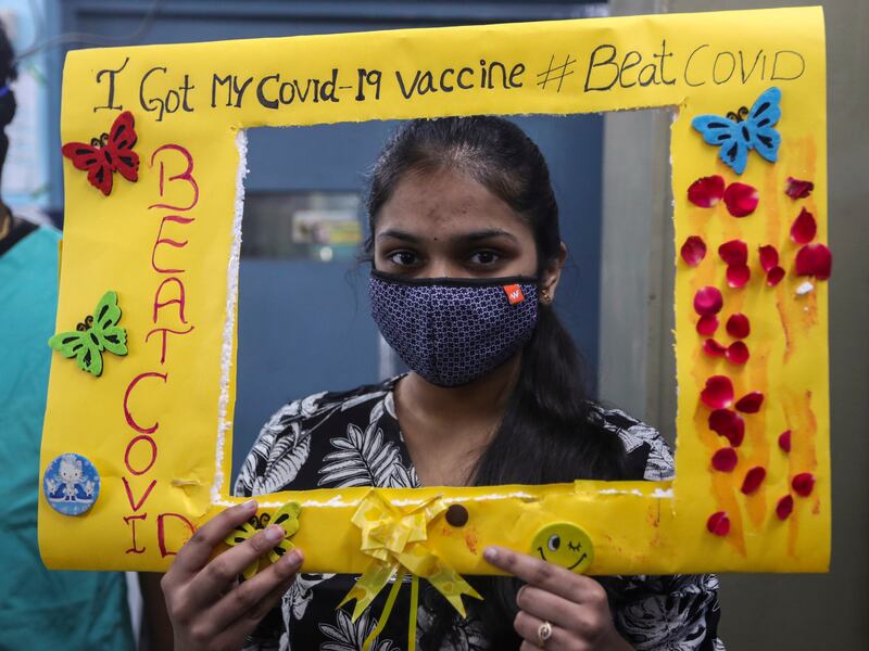 An Indian teenager after receiving a Covaxin inoculation in Hyderabad. India is experiencing a rapid rise in coronavirus infections, particularly in the country's densely populated cities.  AP Photo