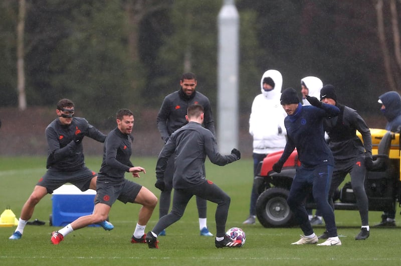 Chelsea manager Frank Lampard and players during training. Reuters