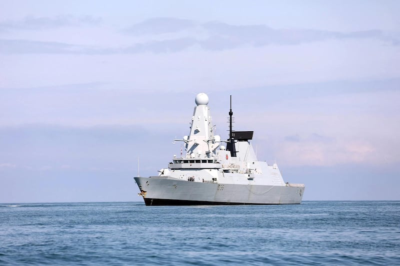 This handout photo taken on June 26, 2021 and released by British Embassy in Georgia, shows the British Royal Navy destroyer HMS Defender arrives in the Black Sea port of Batumi on June 26, 2021.  British navy destroyer, HMS Defender, makes a port call in Georgia’s Black Sea port of Batumi for joint exercises with the NATO-aspirant country’s coast guard, according to the Royal Navy, days after Russia claimed it had fired warning shots at the warship in the coastal waters of Crimea. - RESTRICTED TO EDITORIAL USE - MANDATORY CREDIT "AFP PHOTO /British Embassy in Georgia " - NO MARKETING - NO ADVERTISING CAMPAIGNS - DISTRIBUTED AS A SERVICE TO CLIENTS
 / AFP / British embassy in Georgia / Irakli GEDENIDZE / RESTRICTED TO EDITORIAL USE - MANDATORY CREDIT "AFP PHOTO /British Embassy in Georgia " - NO MARKETING - NO ADVERTISING CAMPAIGNS - DISTRIBUTED AS A SERVICE TO CLIENTS
