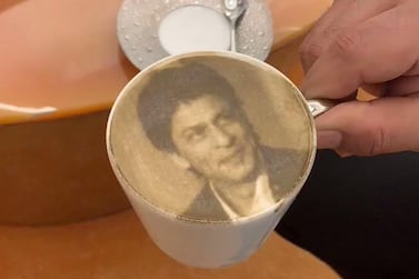 Bollywood star Shah Rukh Khan shared video of himself sipping coffee with his face on it. 