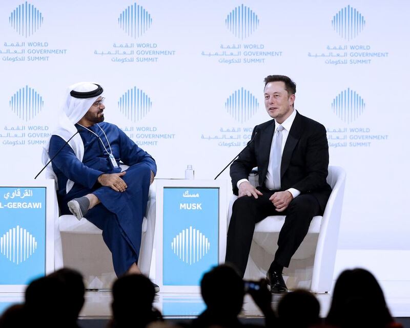 Mohammad Al Gergawi, Minister of Cabinet Affairs, interviews Elon Musk as a moderator for the World Government Summit. Tesla on Monday announced its launch in the UAE. Jeffrey E Biteng / The National