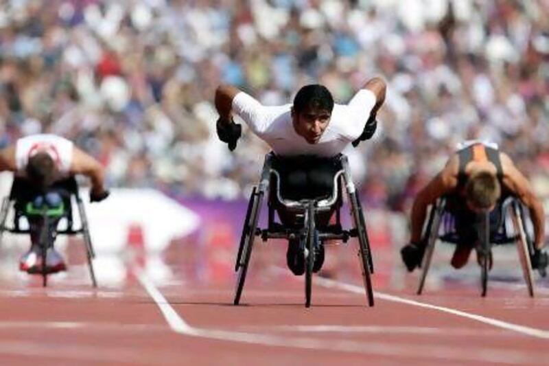 Mohammed Hammandi, centre, briefly held the Paralympic record in the men's 200m T34 sprint but only for a few minutes as after his heat Tunisia's Walid Ktila eclipsed his mark. Hammadi would finish second in the final to Ktila.