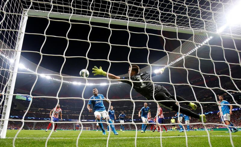 Atletico Madrid's Hector Herrera scores their second goal. Reuters