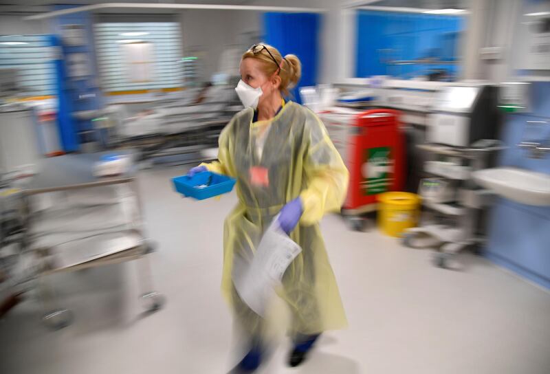 A nurse treats Covid-19 patients in the ICU at Milton Keynes University Hospital. Reuters