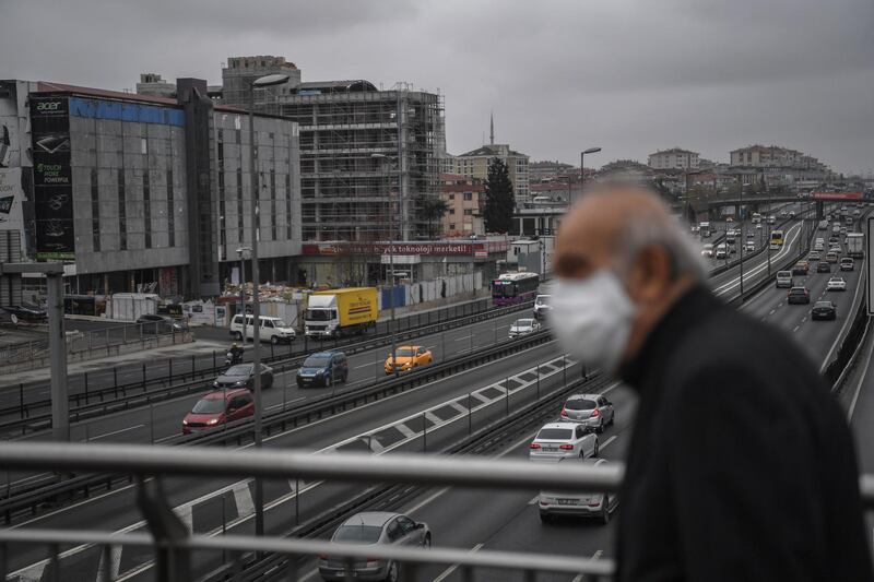 A man walks on a bridge near a bus station in Istanbul a day after Turkish President ordered a fresh lockdown to stop the spread of the coronavirus. AFP