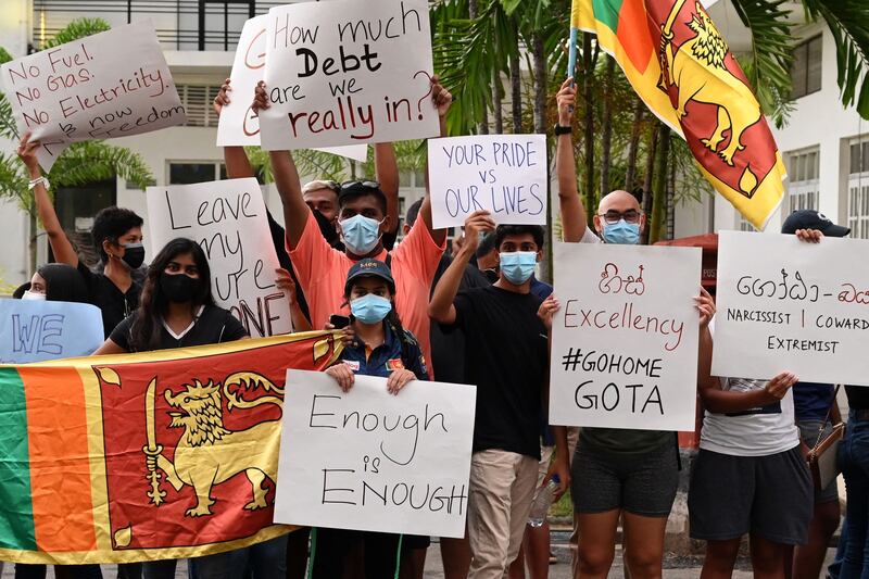 Protestors demonstrate against the surge in prices and shortage of fuel and other essential commodities in Colombo amid a worsening Sri Lankan economic crisis. AFP