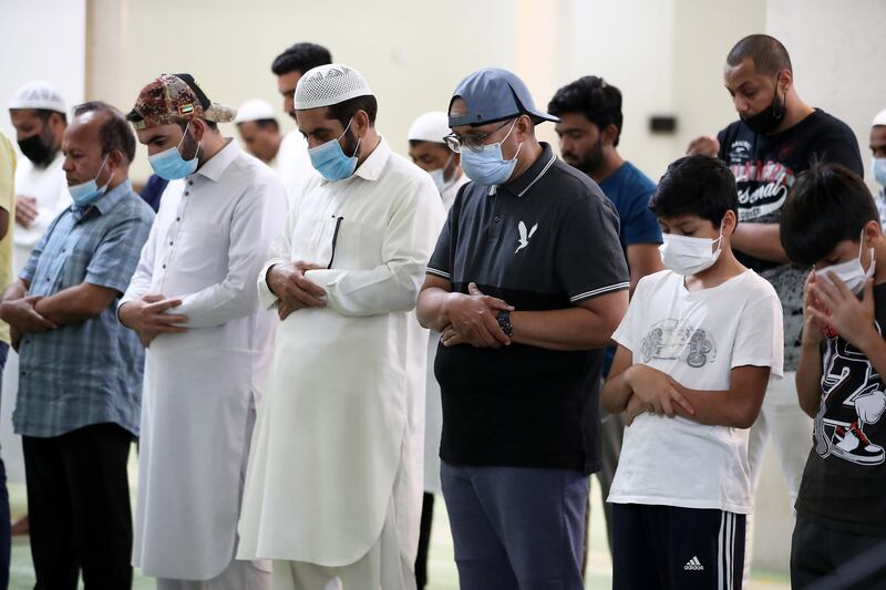 Evening prayers at Jumeirah Mosque in Dubai. Friday devotions were accompanied by news of the death of President Sheikh Khalifa. Pawan Singh / The National 