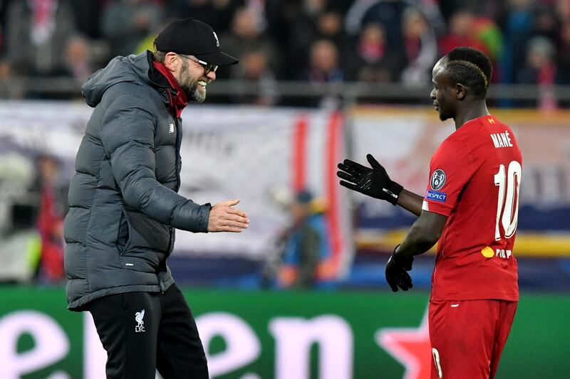 Liverpool's manager Jurgen Klopp celebrates with Sadio Mane at the end of the Champions League match against Salzburg. AP
