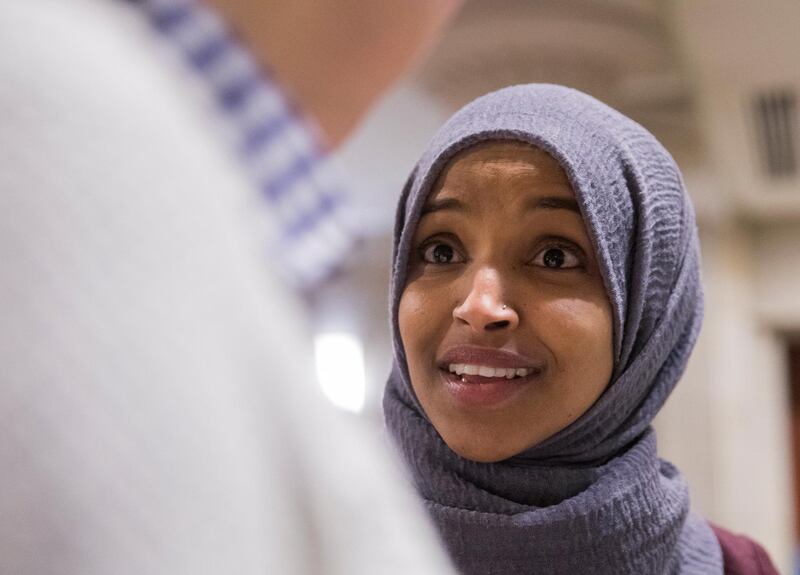 epa07167678 Incoming Democratic House of Representative member Ilhan Omar of Minnesota walks to new member orientation at the US Capitol in Washington, DC, USA, 15 November 2018. The new class of the House of Representatives will be sworn in January 2019.  EPA/ERIK S. LESSER