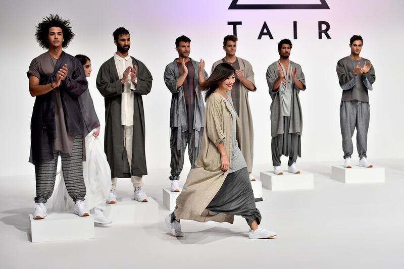 DUBAI, UNITED ARAB EMIRATES - MARCH 25:  Designer Aliya Tair (C) walks the runway during the Tair Presented by Pepsi Presentation at Fashion Forward March 2017 held at the Dubai Design District on March 25, 2017 in Dubai, United Arab Emirates.  (Photo by Cedric Ribeiro/Getty Images) *** Local Caption *** Aliya Tair