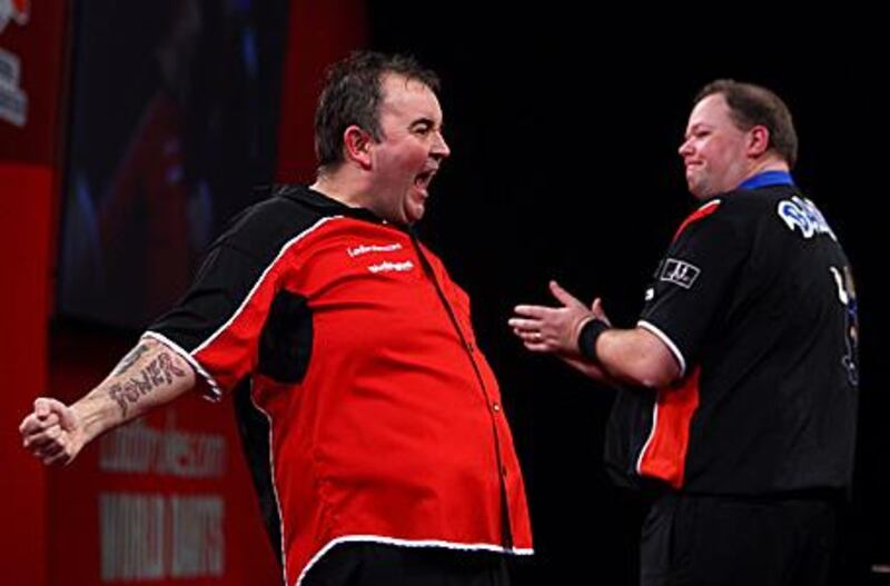 Phil Taylor, left, and Raymond van Barneveld could be visiting Dubai as the Professional Darts Corporation looks to take the game of darts to new markets around the world.