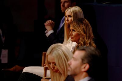 U.S. first lady Melania Trump watches after taking off her face mask while sitting with the rest of the Trump family, including Donald Trump Jr., Tiffany Trump, Ivanka Trump and Eric Trump, before the start of the first 2020 presidential campaign debate between U.S. President Donald Trump and Democratic presidential nominee Joe Biden in Cleveland, Ohio, U.S., September 29, 2020.   Picture taken September 29, 2020.     REUTERS/Brian Snyder