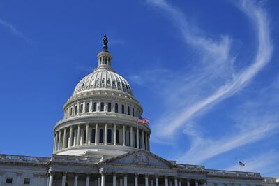 (FILES) In this file photo the dome of the US Capitol is seen in Washington, DC on March 27, 2019. US lawmakers appeared on track December 20, 2020 to pass a roughly $900 billion Covid-19 relief package for millions of Americans, after Democrats and Republicans reached a compromise on the future spending powers of the Federal Reserve. The package is expected to include aid for vaccine distribution and logistics, extra jobless benefits of $300 per week, and a new round of $600 stimulus checks -- half the amount provided in checks distributed last March under the CARES Act.
 / AFP / MANDEL NGAN
