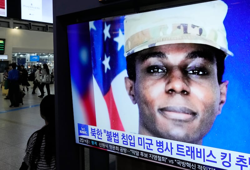 An image of Travis King appears during a news programme in South Korea. AP