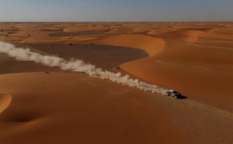 Drivers cross sand dunes in stage 9 of the Dakar Rally in Saudi Arabia. Reuters