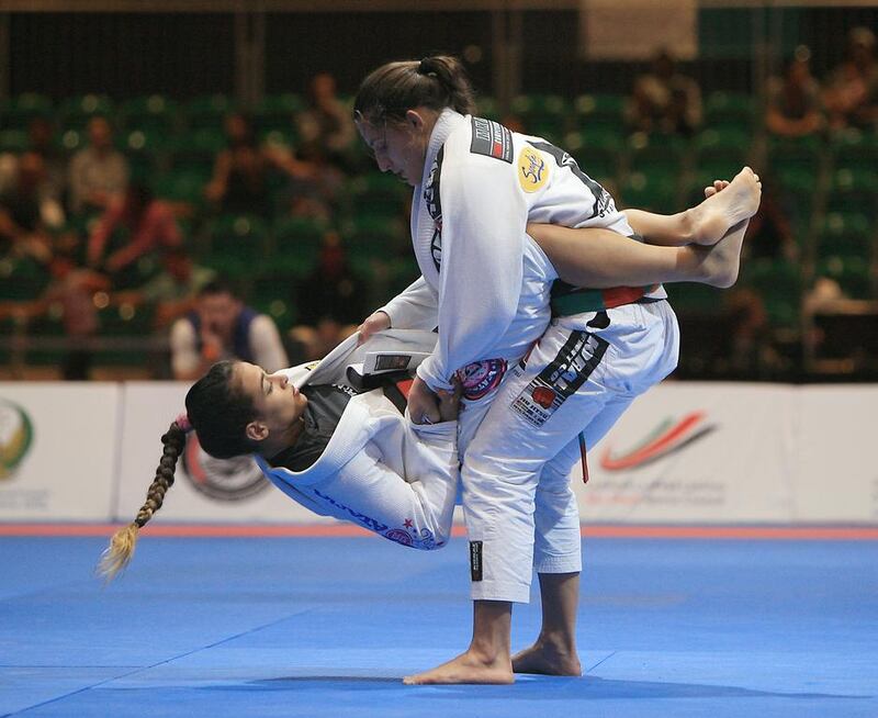 Beatriz Mesquita, left, says she is impressed with the growth she has witnessed every year participating in the Abu Dhabi World Professional Jiu-Jitsu Championships.  Ravindranath K / The National