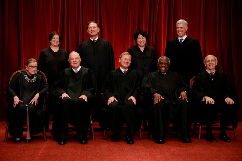 US Chief Justice John Roberts, Justice Ruth Bader Ginsburg, Justice Anthony Kennedy, Justice Clarence Thomas, Justice Stephen Breyer, Justice Elena Kagan, Justice Samuel Alito, Justice Sonia Sotomayor, and Associate Justice Neil Gorsuch, at the Supreme Court building on June 1, 2017. Reuters