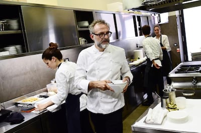 Italian chef Massimo Bottura in the kitchen of his restaurant Osteria Francescana in Modena. Courtesy AFP