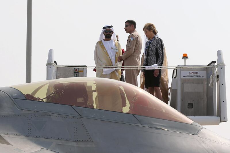 Vice President and Ruler of Dubai, Sheikh Mohammed bin Rashid, looks at a US F-22 Raptor fighter jet during the Dubai Airshow on Sunday, November 12, 2017. Karim Sahib / AFP